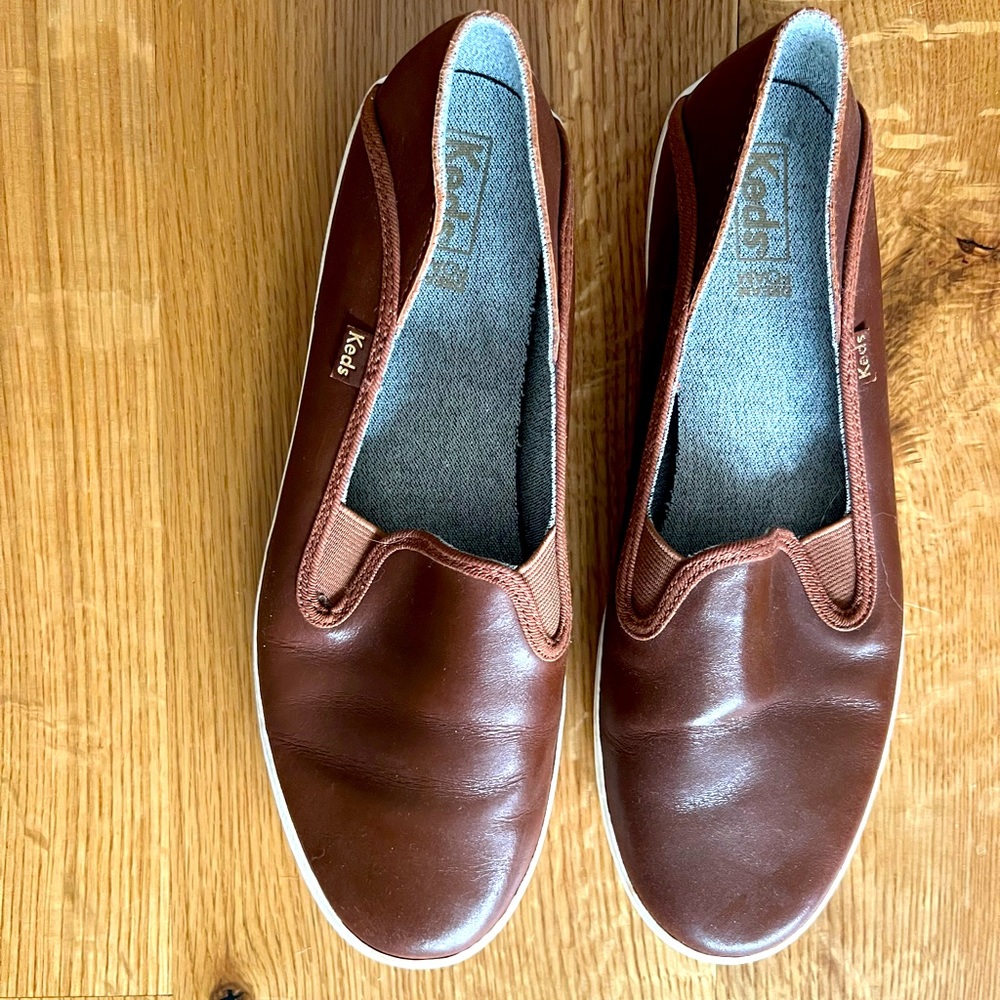 Keds leather slip on sneakers.  Gently worn in very good condition.